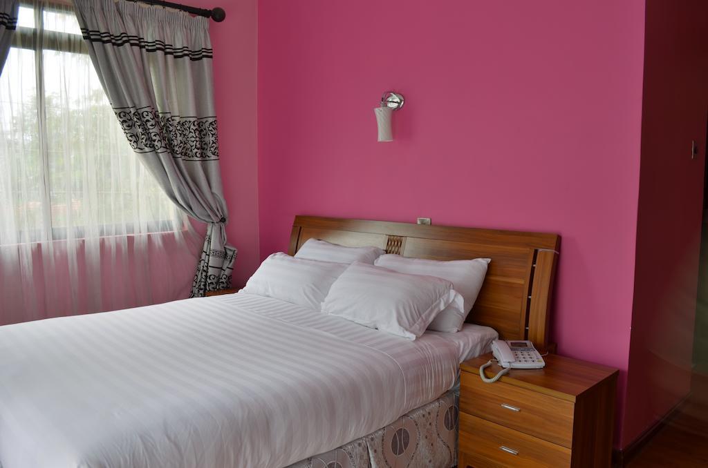 Fahari Palace Serviced Apartments Найробі Номер фото